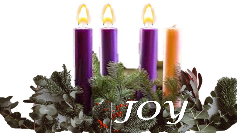 Purple candles wrapped with pine wreath